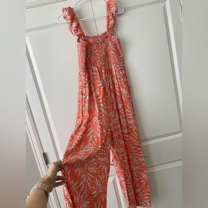 Ann Taylor Loft smocked wide leg jumpsuit, women’s sz M, orange w/pattern, NWT